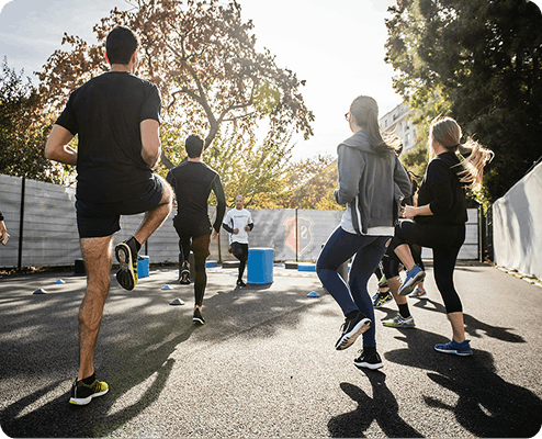 Group of employees participating in an outdoor walking challenge
