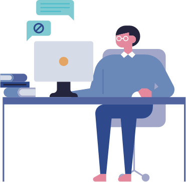 An illustration of an employee working at their desk.